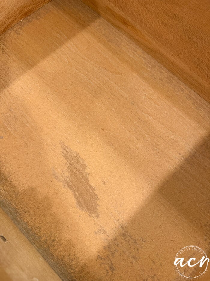 inside of drawer with particleboard