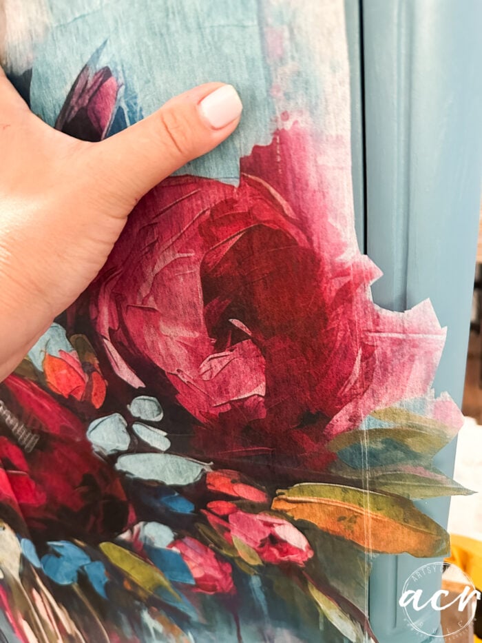 cutting out the decoupage fiber and roses leaves etc