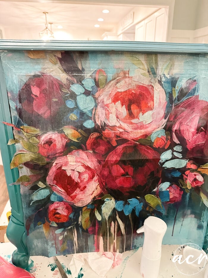 working the decoupage fiber onto nightstand