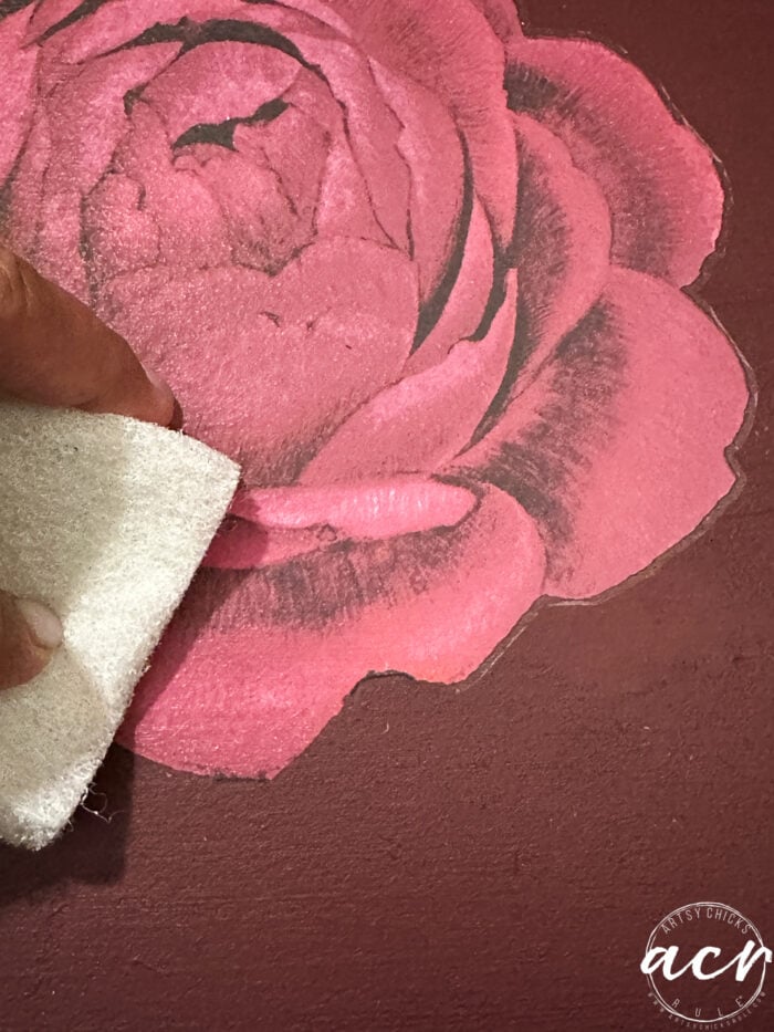red rose on bottom of drawer