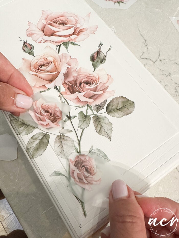 adding two tiny roses to the bottom of the stem area