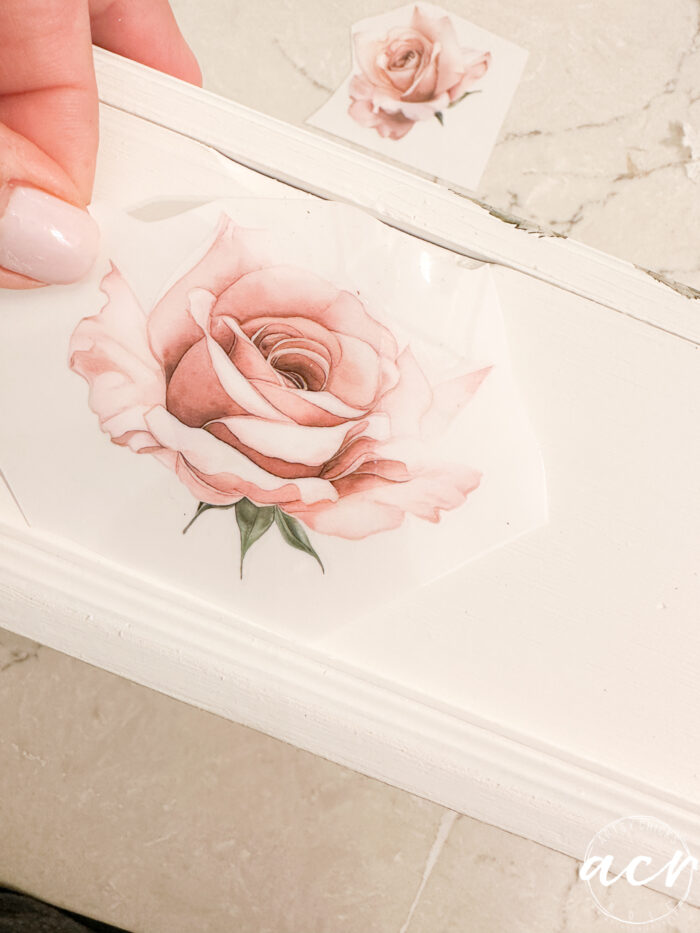 adding a large rose transfer to the front of the white box
