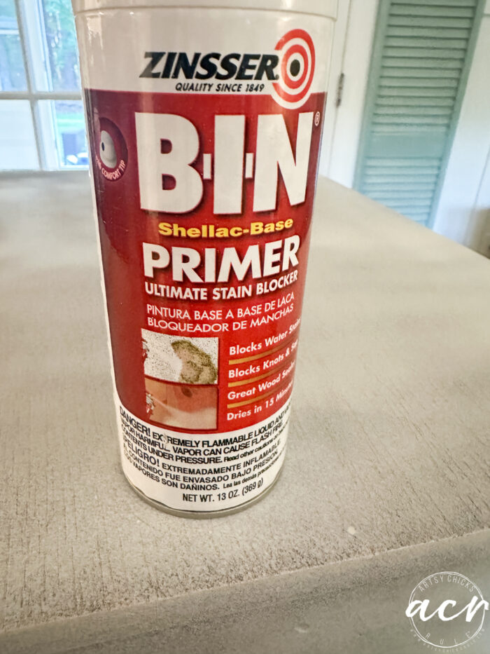 primer spray can on table