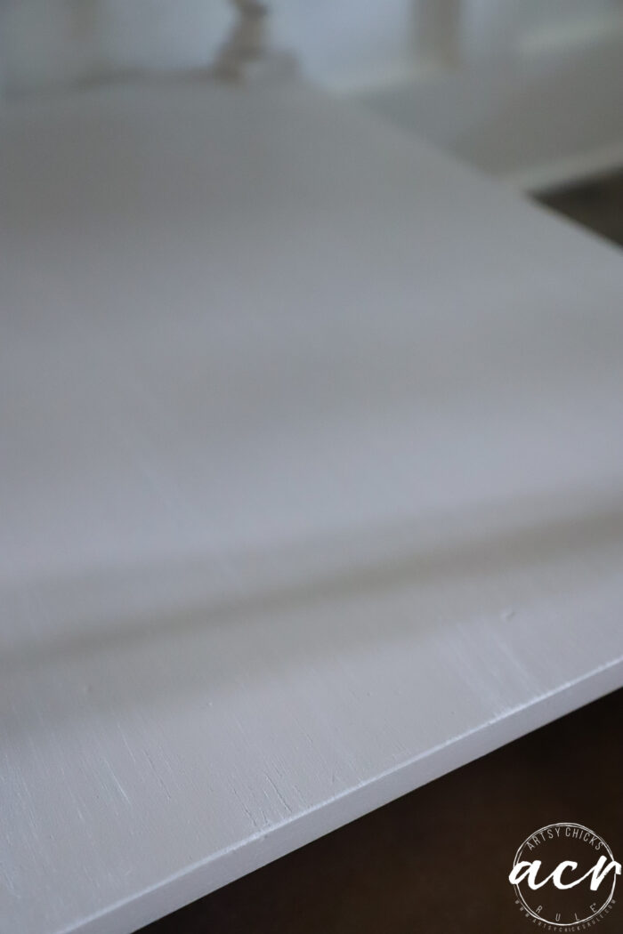 up close of bottom shelf that has dry brushing