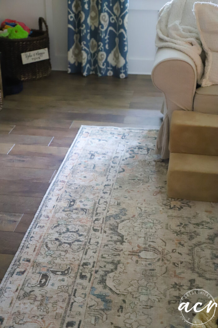 blue, tan, brown, coral rug