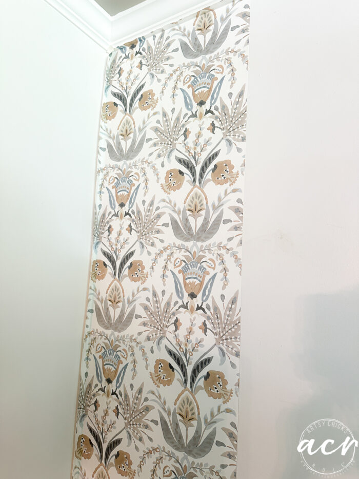 first piece of wallpaper is up