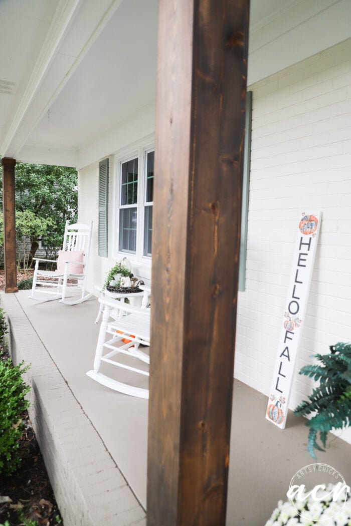 porch with sign with block print