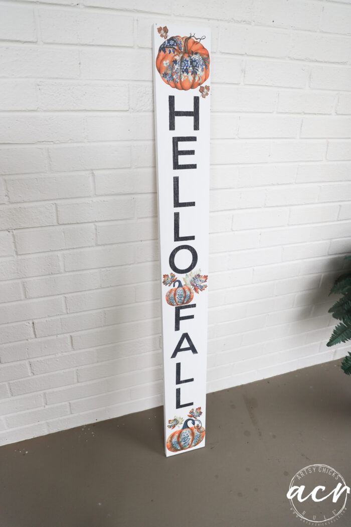 hello fall sign against brick porch with block print