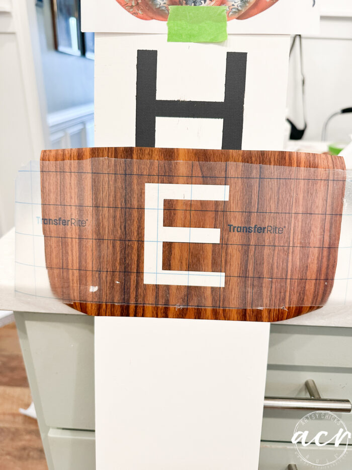 letter e in vinyl on board
