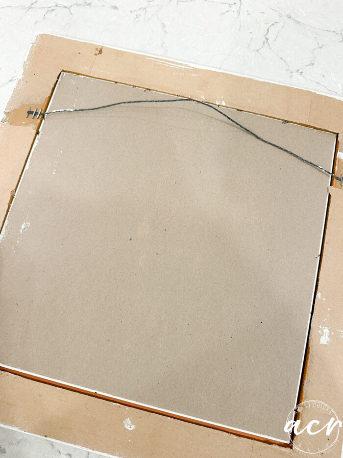 the backside of the frame and artwork
