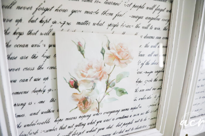 the new framed art showing how the top smaller square with the flowers is raised over the scripted one