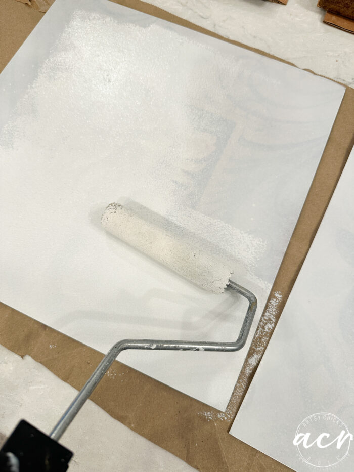 rolling paint onto print