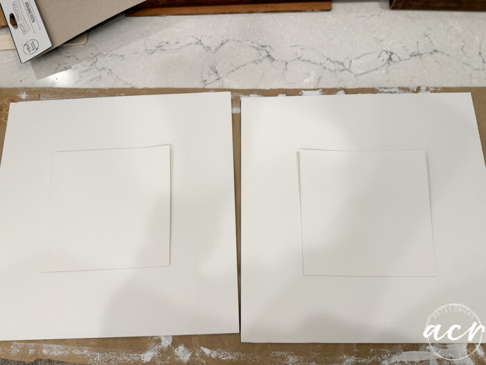 white paper cut in squares one large one small