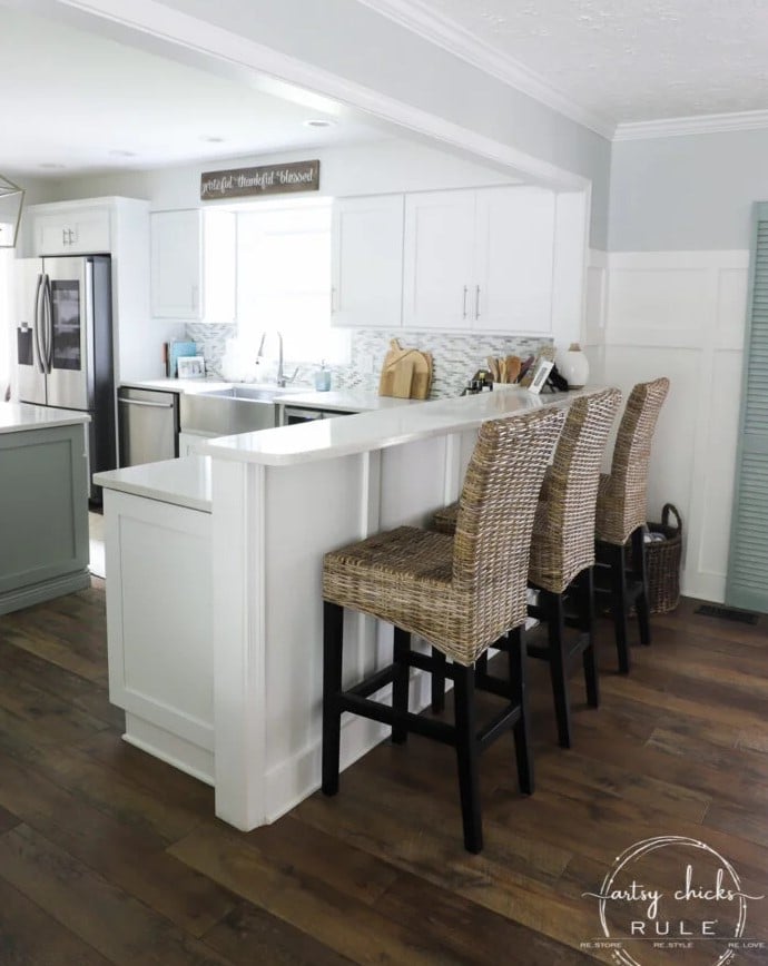 same kitchen wall not half gone and bar top instead with chairs open to kitchen