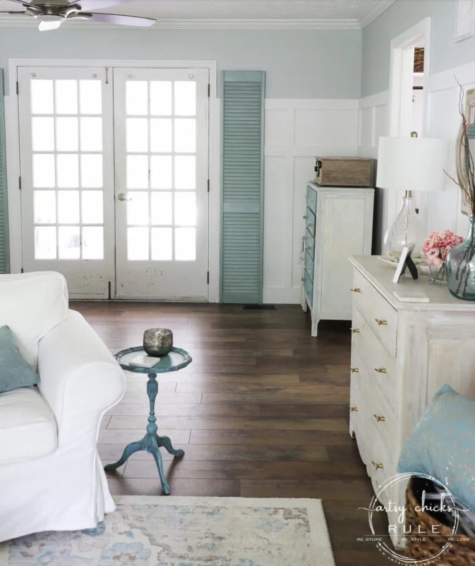 white french doors, blue and white walls, white chair