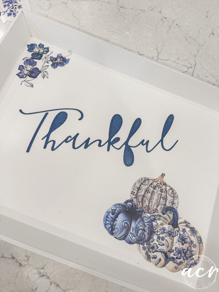 stencil removed revealing the word thankful
