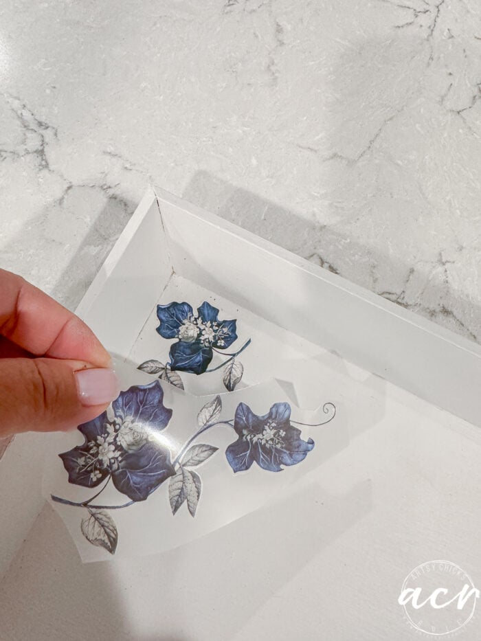 blue flower transfers in corner of tray