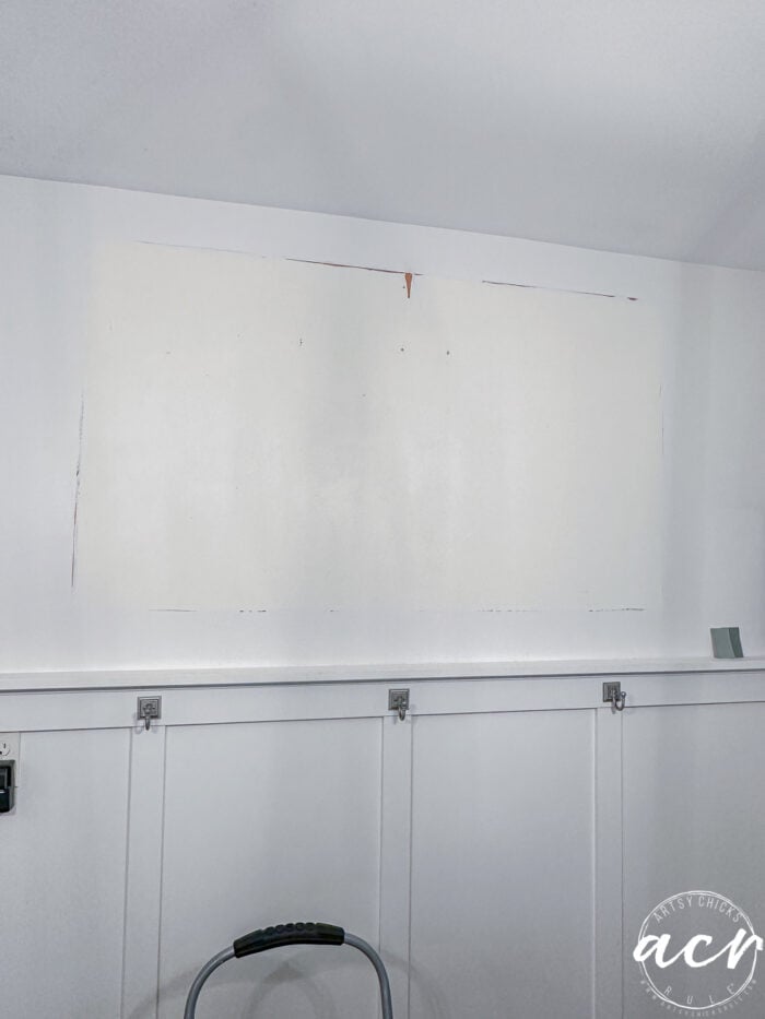 wall where mirror was is different color