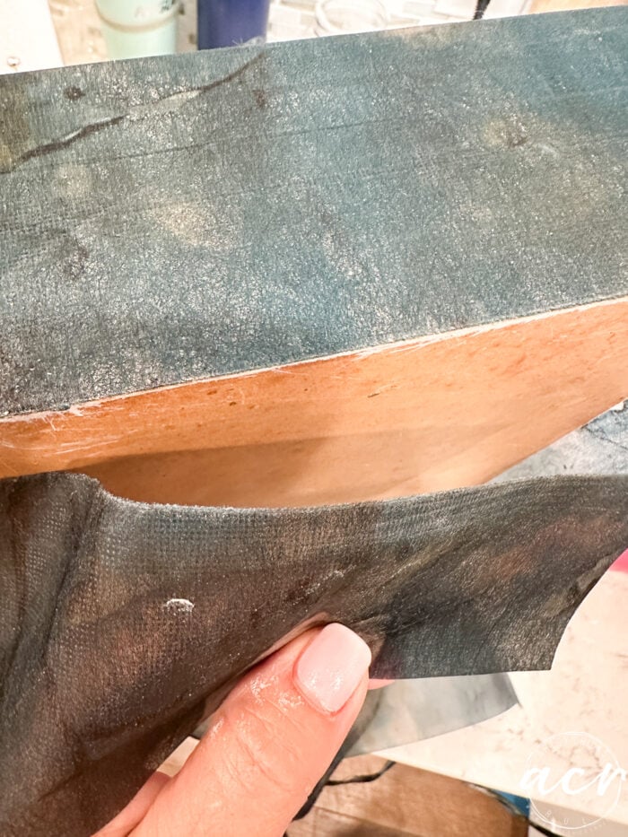 bottom of box with sanded paper removed