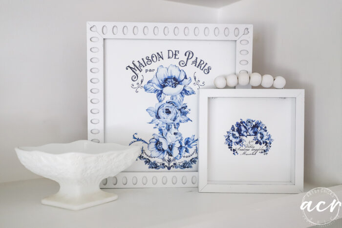 3 pieces of blue and white framed art with white dish