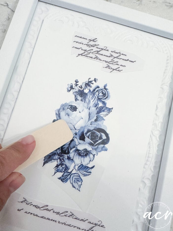 applying script and blue flowers transfer