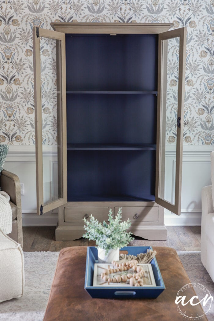 wood look cabinet with black interior