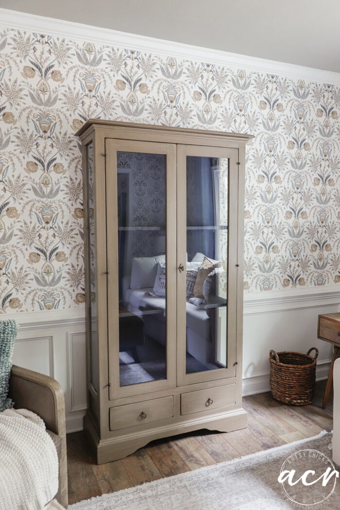 wood look cabinet with doors closed