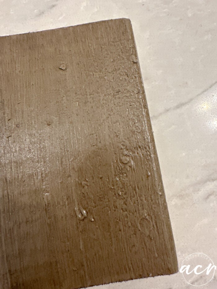 paint and stain on a wood block