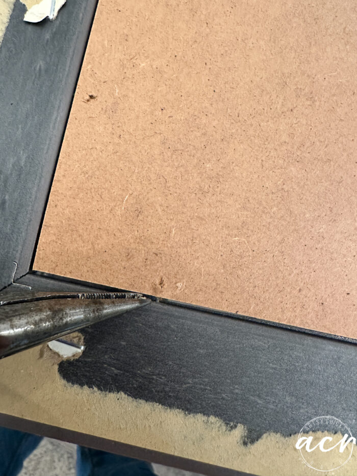 using pliers to remove staples