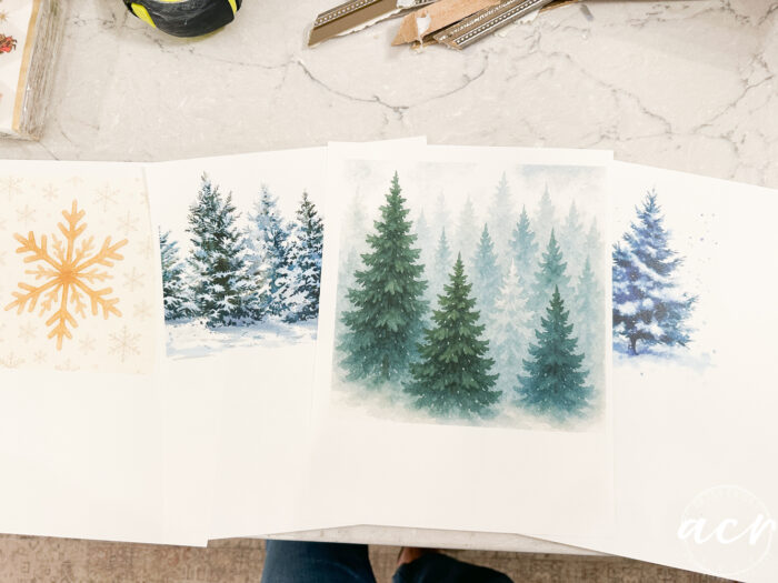 printed images of trees and snowflakes on white paper
