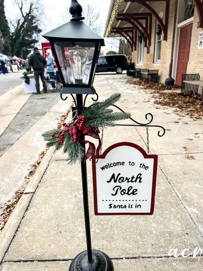lantern with north pole sign
