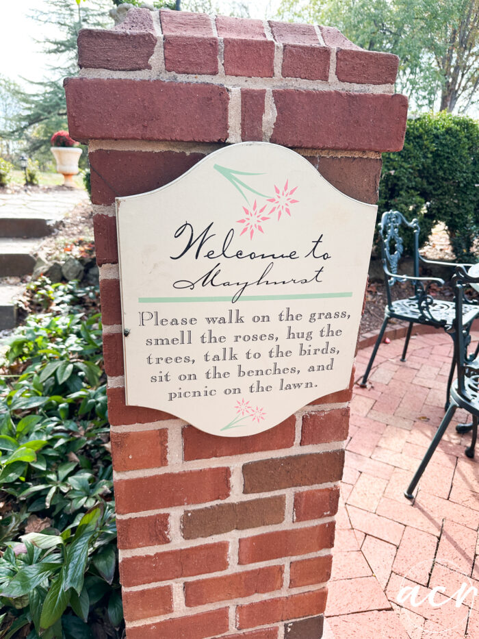 sign at mayhurst in the courtyard