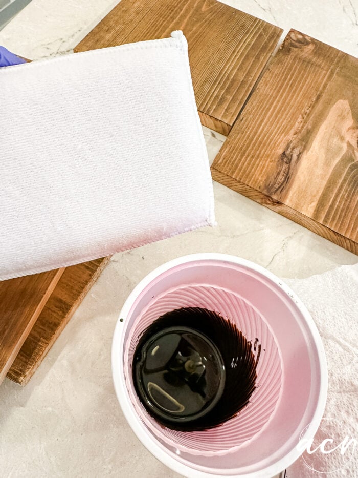 using applicator to apply stain