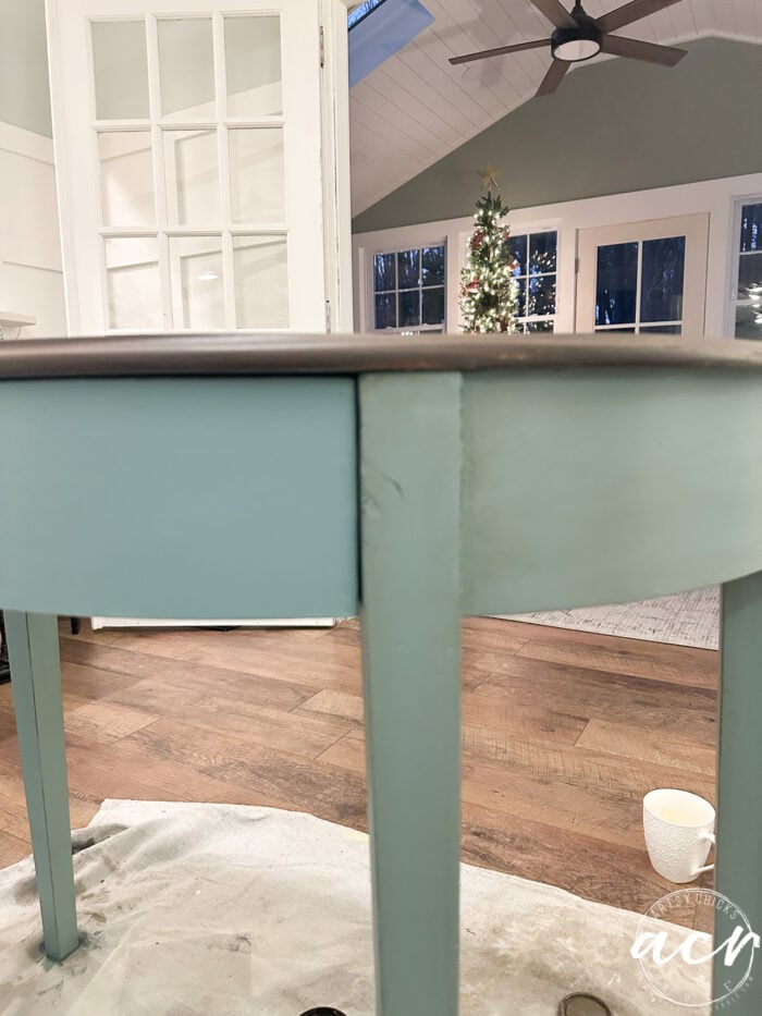 showing stain on one side of the table and not on the other