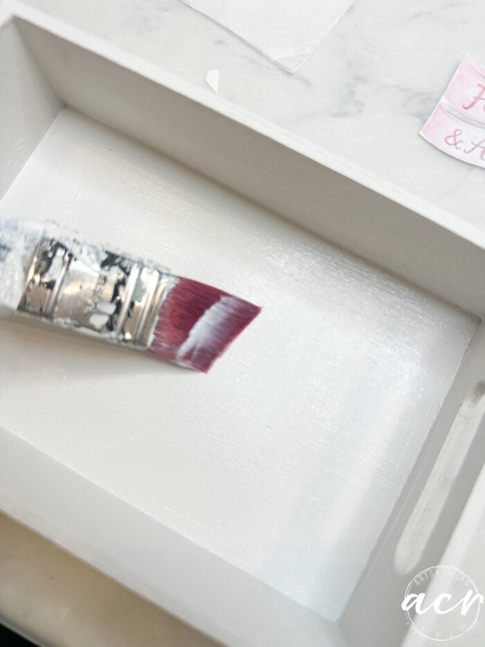 applying transfer gel to bottom of box