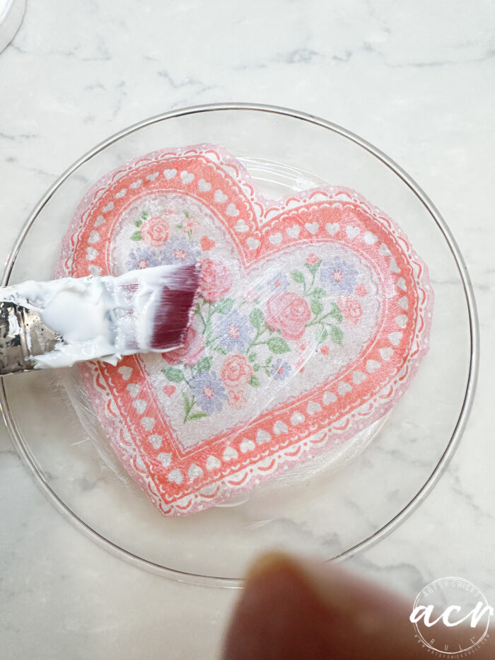 applying transfer gel to heart on glass plate on back