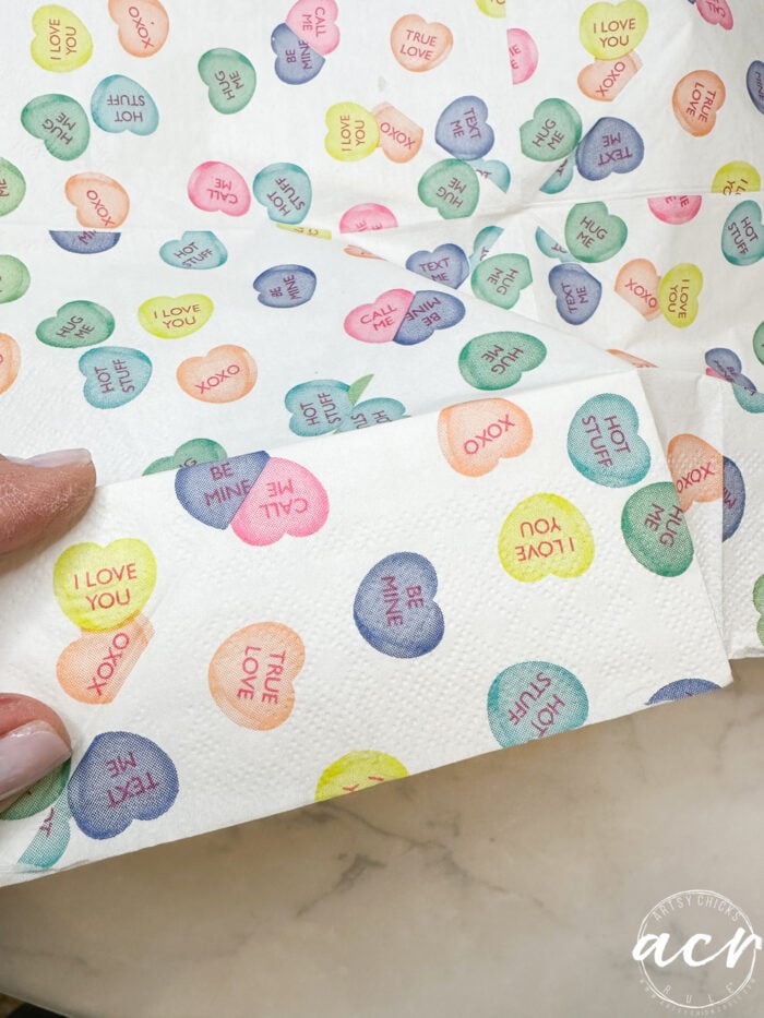 candy heart colorful napkin on side of box