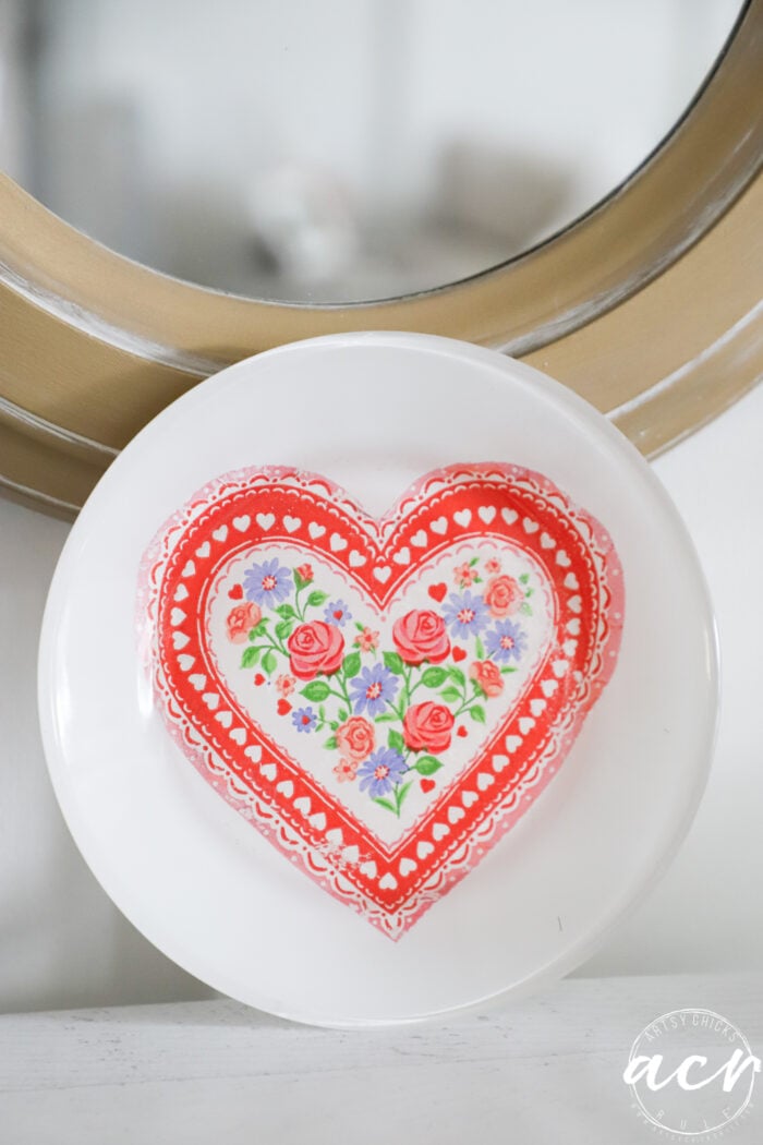 red heart on plate from the front side painted white 