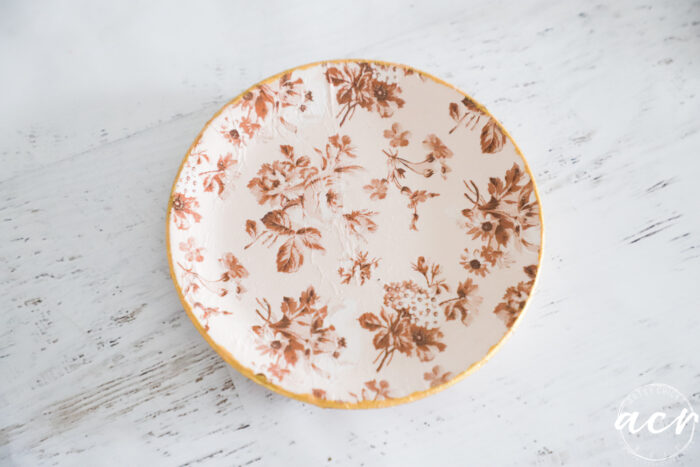 small decoupaged plate with gold edge