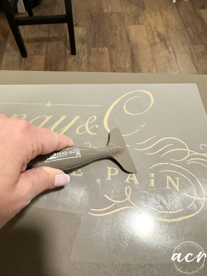 using the plastic transfer tool to apply transfer