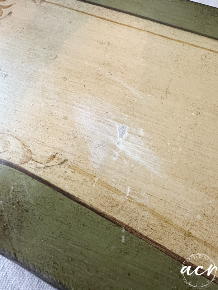 sanded area of table showing underneath