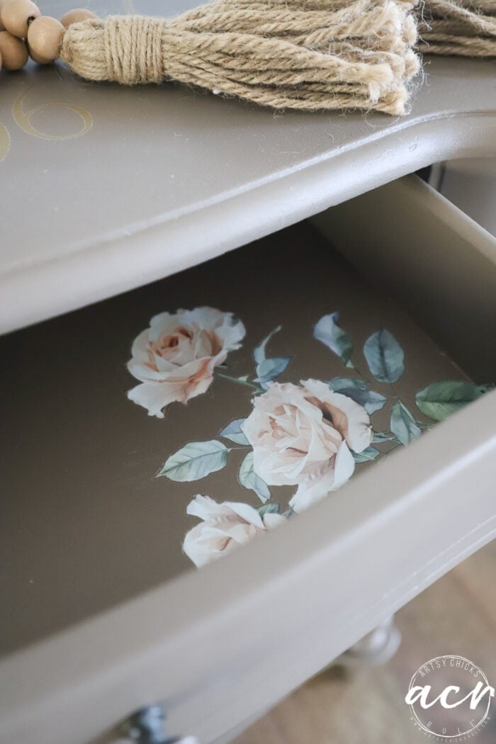 finished drawer open with pink roses inside on bottom of drawer