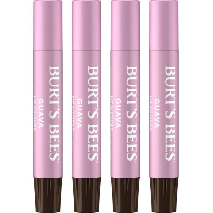Four pink Burt&rsquo;s Bees lip shimmers in guava flavor stand upright in a row, with dark brown caps and white text on the tubes&mdash;one of my latest Amazon Finds and definitely among the Things I&rsquo;m Loving right now.