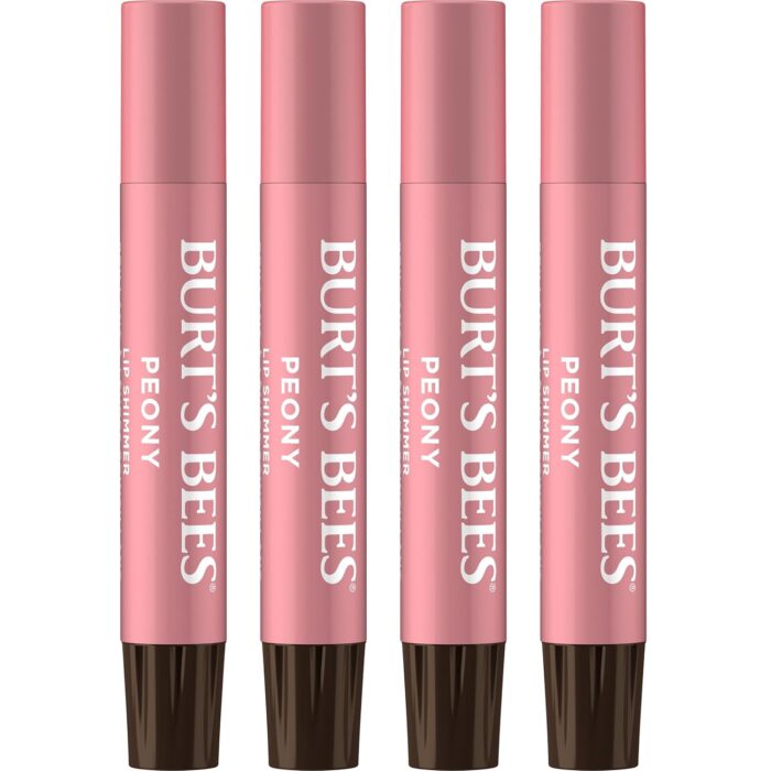 Four Burt&rsquo;s Bees Peony Lip Shimmer tubes stand upright side by side. The tubes are light pink with dark caps, and the product name is printed vertically in white text&mdash;definitely one of my recent Amazon Finds.