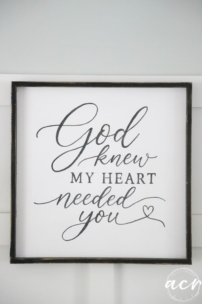 Framed sign with elegant script reads: God knew my heart needed you, with a small heart next to the word you. This charming God Knew My Heart Needed You Sign adds a warm touch to any room—perfect for displaying as-is or as part of your next thrifted redo project.