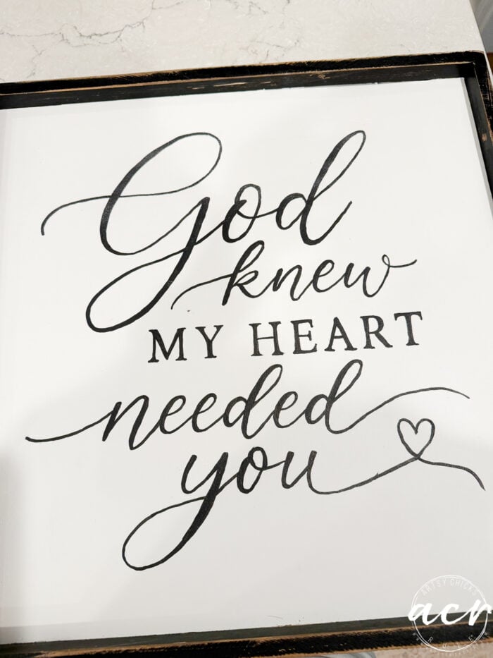 A charming God Knew My Heart Needed You sign features elegant script on a framed board, complete with a small heart detail at the end—a perfect thrifted redo to add warmth and inspiration to any space.