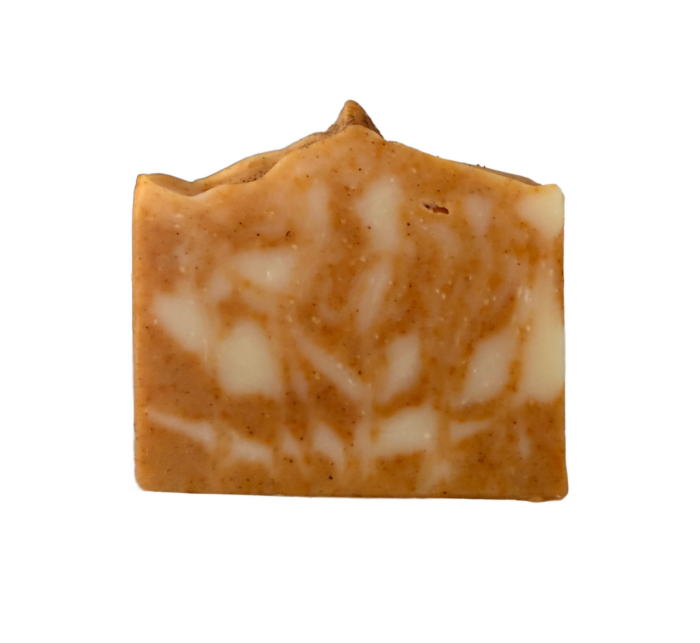 A rectangular bar of marbled orange and white soap with a slightly textured top edge, displayed on a plain white background—this beautiful soap is perfect for those seeking all natural soaps to enhance their fall routine.