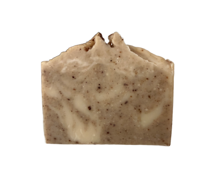 A rectangular bar of all natural soap with a rough, uneven top and a marbled beige and brown appearance, set against a plain white background.