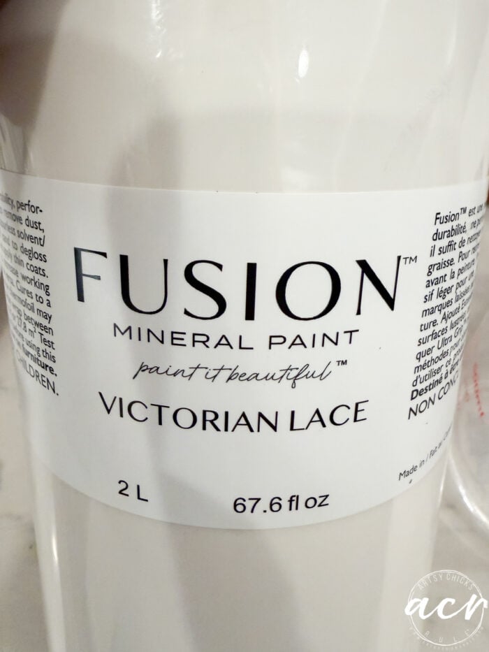 A 2-liter container of Victorian Lace Fusion Mineral Paint, perfect for creating a faux concrete look on DIY concrete planters.